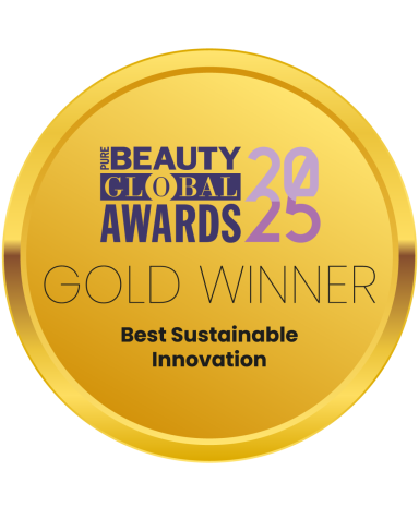 Médaillon doré indiquant "Gold Winner" pour l'innovation durable aux Beauty Global Awards 2023.