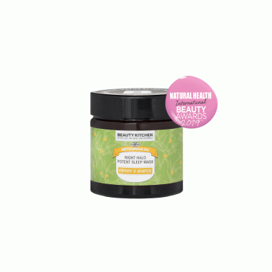Crème hydratante dans un pot noir avec étiquette colorée et autocollant "Beauté".
