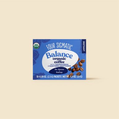 Boîte de café biologique "Balance" avec des grains de café illustrés.